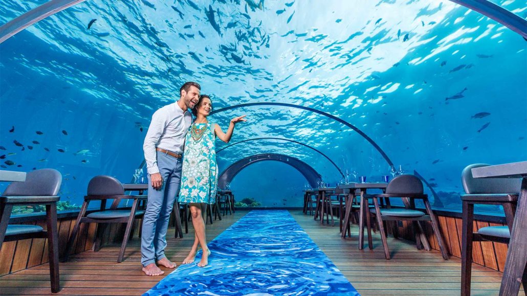 Couple in a underwater reataurant